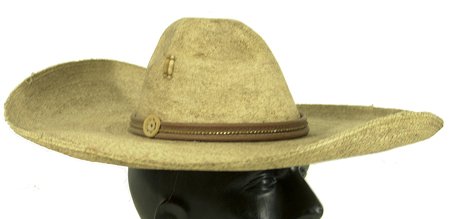 Vintage Mexican Sombrero: Classic old hand woven hat with leather band; very good condition. 19" Circa Early/Mid 1900s