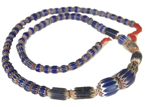 Chevron Tradebead Necklace: Strand of older, small, rounded six-layer red, white, and blue chevron tradebeads. 28" Circa: Late 1800s