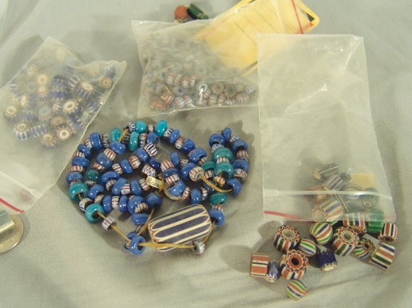 Antique Tradebeads: Bagged collection of old chevron and glass tradebeads. Various sizes Circa: Various Ages
