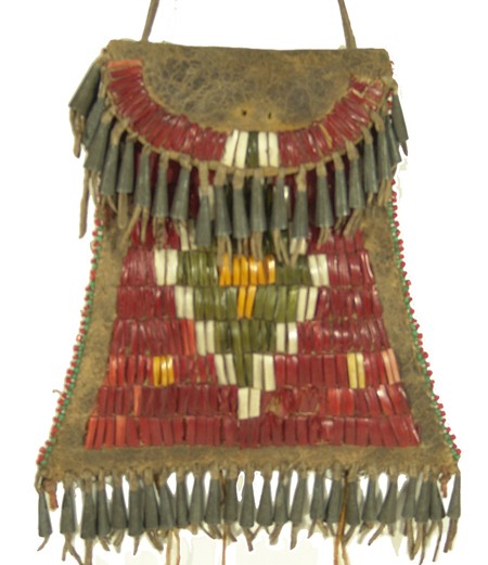Southern Cheyenne Strike-a-lite Bag: Rare, early, flared hide bag with bird quill design sinew sewn on front with bead trim and tin cone suspensions. Condition: very good, a few missing quills. 5-3/4" x 5" Circa: Mid-Late 1900s