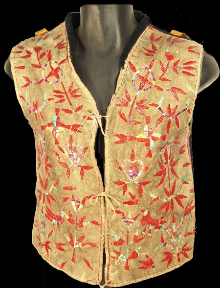 Santee Sioux Quilled Vest: Very rare version of the previous lot with bird and animal figures and blue calico lining and velvet back. Condition: good. Men's L/XL, 24" long Circa: Late 1800s