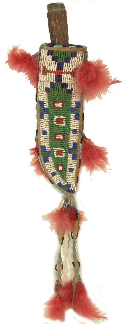 Sioux Beaded Knife Sheath: Beautiful sinew sewn and lazy stitch beaded hard buckskin knife case with traditional geometric designs. With antique knife. Condition: very good. 7" x 2-1/2" plus 7" drop, knife 8-1/2" Circa: Early 1