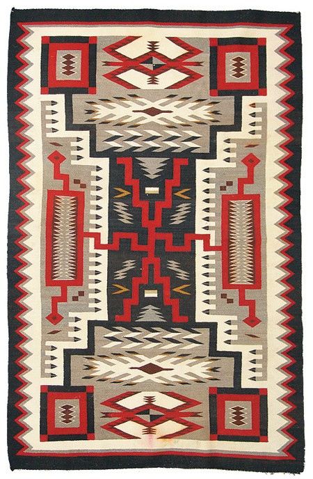 Navajo Rug: Home spun storm pattern rug with water bugs and lightning design, in natural and aniline colors. 7' x 4'6-1/2" Circa: 1950