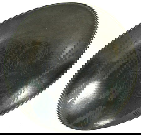 San Ildefonso Pottery Plate: Large, traditional, black matte-on-black with interesting bird and snake design. Condition: good, with light scratches and handling. 15" x 2-1/2" Circa: Early to mid 1900s