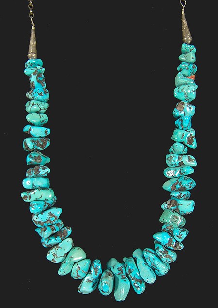 Turquoise Nugget Necklace: All natural Lone Mountain turquoise nugget necklace with graduated sterling cones and chain. Ex: Bill McGee Collection. 21" Circa: Ca. 1960s