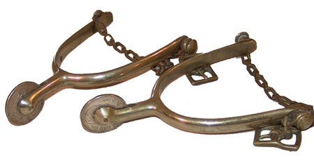 Vintage Buermann Spurs: Beautiful pair of military issue brass spurs with unique rowels made with peso coins. Condition: excellent. Circa: Early 1900s Size: standard