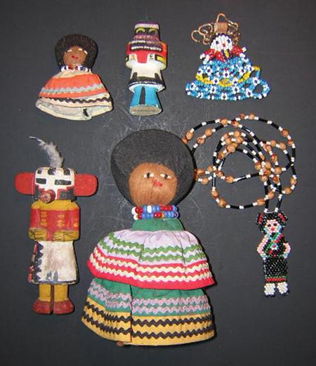 Native Doll Collection: 6 piece doll collection including 2 cloth dolls from the Seminole Everglades, 2 wooden Route 66 katsinas, 1 beaded Zuni doll, and 1 beaded Apache doll. Size: Largest 5-1/2" high Circa: 1950s - 60s