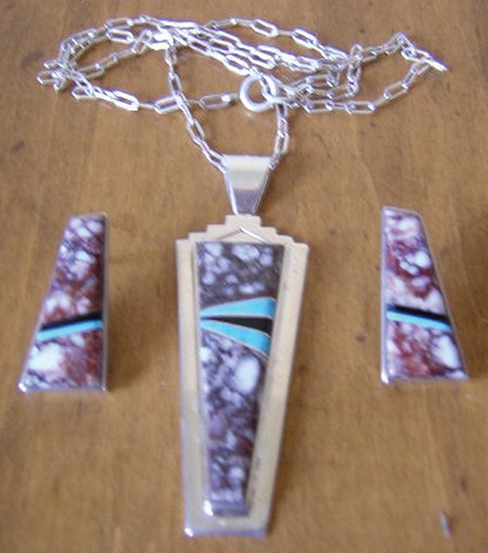 Navajo Pendant - H & V Thompson: Navajo contemporary sterling silver pendant on chain with matching post style earrings. Hallmarked. Size: 2-3/4" x 1", Chain 20" Circa: 2000