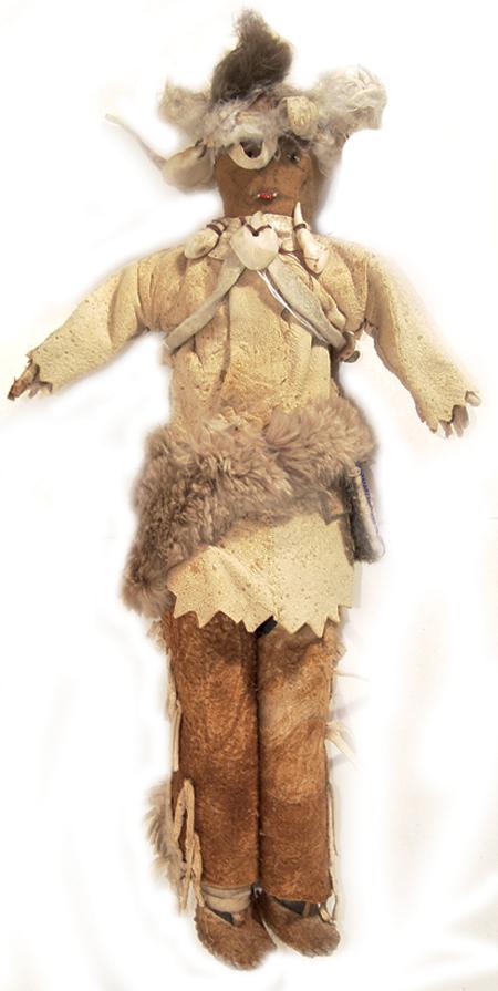 Plains Beaded Doll: Handcrafted all buckskin doll with leggings, scout's jacket and partial feather headdress. Size: 14" Circa: Mid 1900s