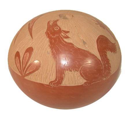 Santa Clara Seed Pot- Corn Moquino: Very fine globular redware pottery vessel with a howling coyote and other figures done in sgraffitto. Very good condition. Circa: 1980s Size: 3" x 3-1/2"