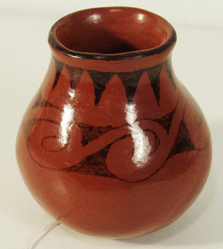 Maricopa Pottery- Ida Redbird: Classic small black on red pottery jar with traditional gloss finish. Very good condition. Circa: Mid 1900s Size: 4-1/2" x 4"