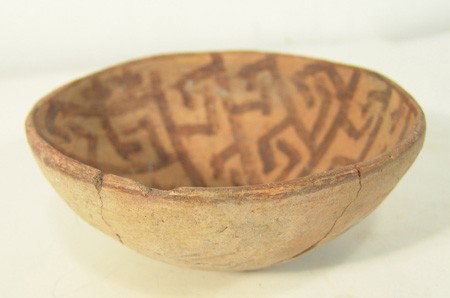 Hohokam Pottery: Classic small red on buff bowl with interior geometric designs. Very good condition, some professional restoration. Circa: Prehistoric Size: 2" x 5-1/2"