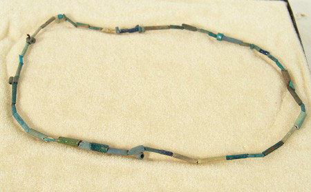 Ancient Egyptian Bead Necklace: Rare strand of excavated Egyptian blue glass trade beads. Good condition. Circa: Prehistoric Size: 18"