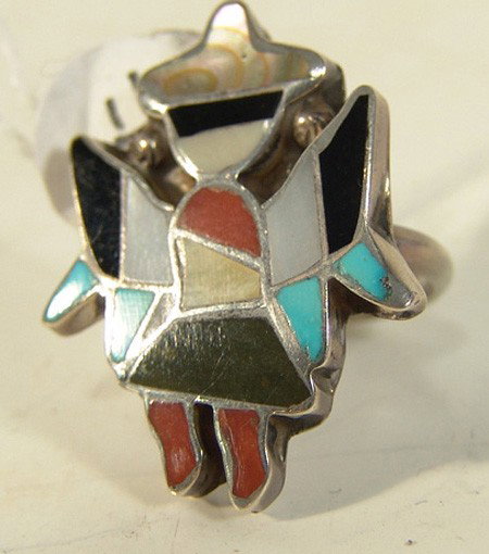 Zuni Inlay Ring: Small channel inlay ring in batwing dancer form. Very good condition. Circa: 1970s Size: 5-1/2