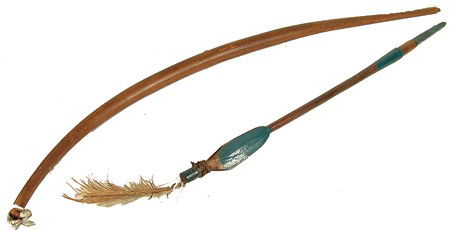 Osage Bow and Arrow: Rare well used hand carved and painted orange wood bow and one arrow. Good condition, no bow string. Circa: Early/Mid 1900s Size: 27" and 30"