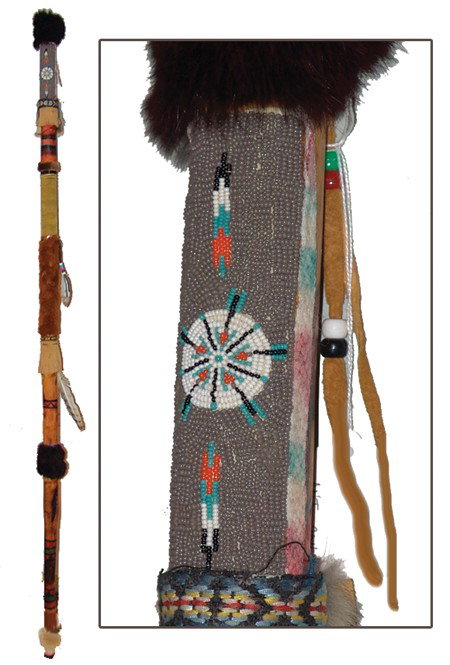 Cheyenne Style Speakers Staff: Long hand crafted wooden staff with geometric designs, fur and feather trim, and large beaded panel near top. Very good condition. Circa:Late 1900s Size:71" x 2"