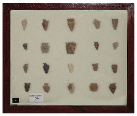 Arrowhead/Relic Collection: Framed collection of 20 assorted stone tools or arrowheads of various ages. Circa:Various Size:11" x 13" framed