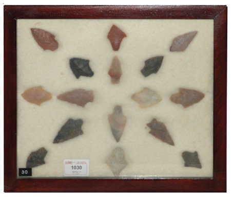 Arrowhead/Relic Collection: Framed collection of 16 assorted stone tools or arrowheads of various ages. Circa:Various Size:11" x 13" framed