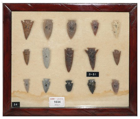 Arrowhead/Relic Collection: Framed collection of 15 assorted stone tools or arrowheads of various ages. Circa:Various Size:11" x 13" framed