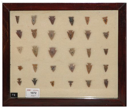 Arrowhead/Relic Collection: Framed collection of 30 assorted stone tools or arrowheads of various ages. Circa:Various Size:11" x 13" framed