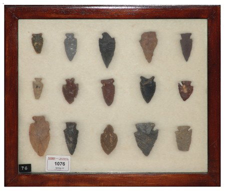 Arrowhead/Relic Collection: Framed collection of 15 assorted stone tools or arrowheads of various ages. Circa:Various Size:11" x 13" framed