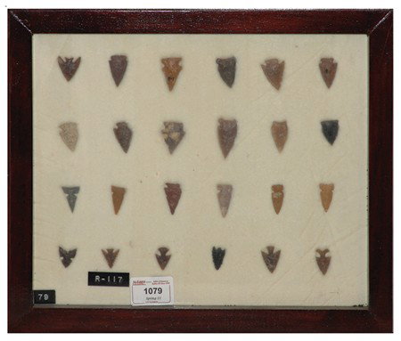 Arrowhead/Relic Collection: Framed collection of 24 assorted stone tools or arrowheads of various ages. Circa:Various Size:11" x 13" framed