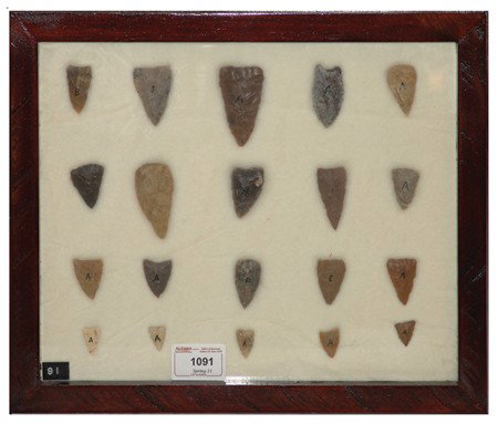 Arrowhead/Relic Collection: Framed collection of 20 assorted stone tools or arrowheads of various ages. Circa:Various Size:11" x 13" framed