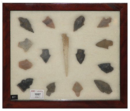 Arrowhead/Relic Collection: Framed collection of 15 assorted stone tools or arrowheads of various ages. Circa:Various Size:11" x 13" framed