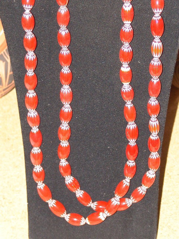 Trade Beads: 2 strands of highly poished 7 layer red chevron trade beads. 34" long, 1" each