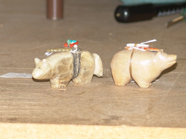 2 Zuni Bear Fetishes: 2 hand carved Zuni bear fetishes, 1 fat and one long, both with medicine bundles, in excellent condition. 2" x 3" and 2" x 4"