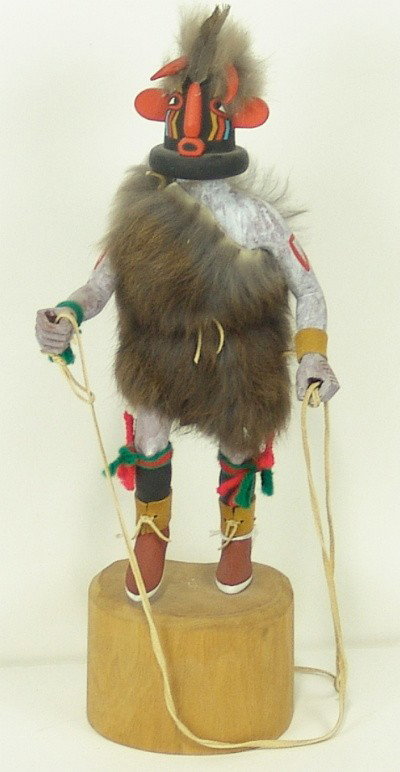 Hopi Katsina - Early Yowytewa : Hand carved Hopi katsina doll shown in action by Earl Yowytewa. 13-1/2" high