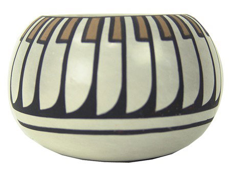 San Idefonso Pottery Bowl- Blue Corn: Circa 1960s, Fine polychrome on buff pottery bowl with beautiful feather design. Very good condition with two small pits on one side. 2-1/4" x 3-1/2"