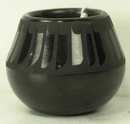 San Ildefonso Pottery Jar- Beverly Martinez: Circa 1970s, Classic and beautiful black-on-black pottery jar with repeating feather design. Very good condition except for a small rim chip. 3" x 3-1/4"
