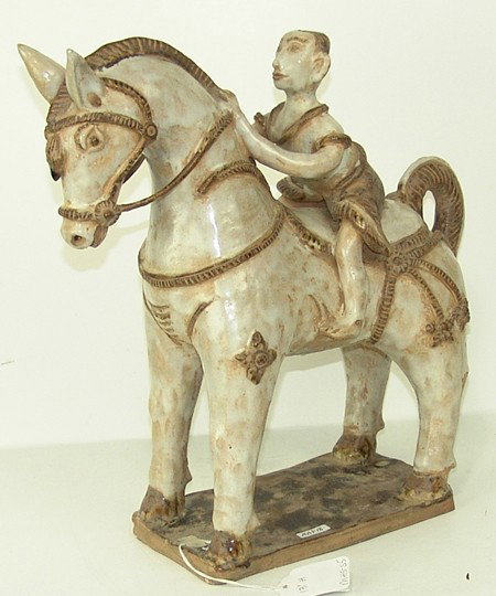 Buddhist Sculpture: Rare Ko-Min-Kyaw warrior on a decorated horse, a glazed ceramic from the Buddhist revival period in the early 1900s. Very good condition. 14" x 11" x 5". Early 1900s