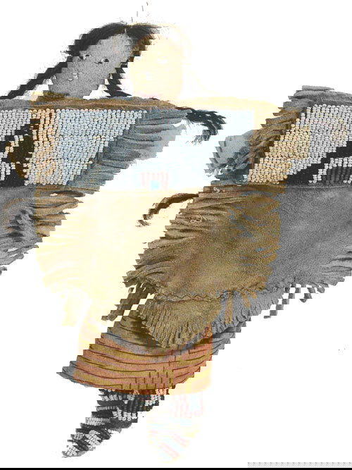 Plains Doll: Circa 1980's Classic, old-style, stuffed buckskin doll with thread sewn lazy stitch yoke and moccasins, human hair, and cotton cloth skirt. 9-1/2" x 6"