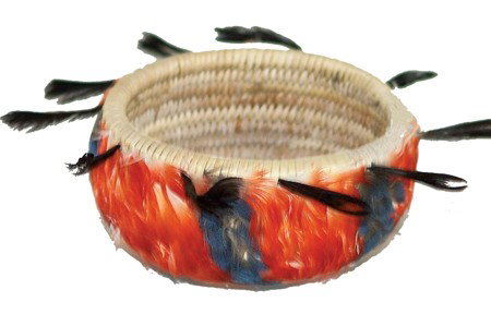 Pomo Feather Basket: Circa Mid 1900s, Outstanding woven basket completely covered with orange feathers and trimmed with quail top-knots. Very good condition. 1-1/4" x 2-1/2" From the Johnson Collection.