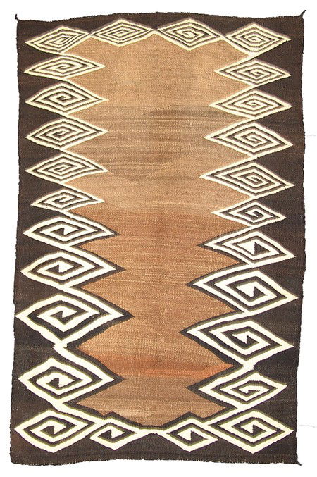 Navajo Rug/Weaving: Circa 1930s, Unique early Crystal rug in brown, dark brown, and cream colors with interesting and elaborate diamond maze design. Good overall condition, shows some use. 59" x 36"