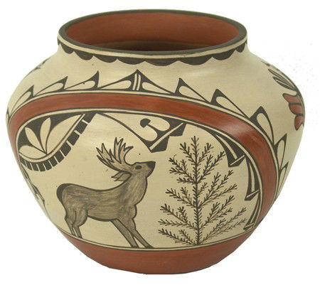 Zia Pottery Jar- I. Herrera: Circa Late 1900s, Beautiful medium sized wide mouthed olla with traditional Zia birds and figures, plus deer and trees. Very good condition. 8" x 9-1/2"