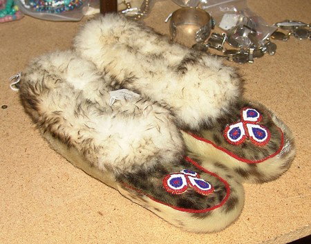 Eskimo Mukluks: Pair of Eskimo hand made seal skin and rabbit fur mukluks or moccasins. Size: 10-1/2 long"