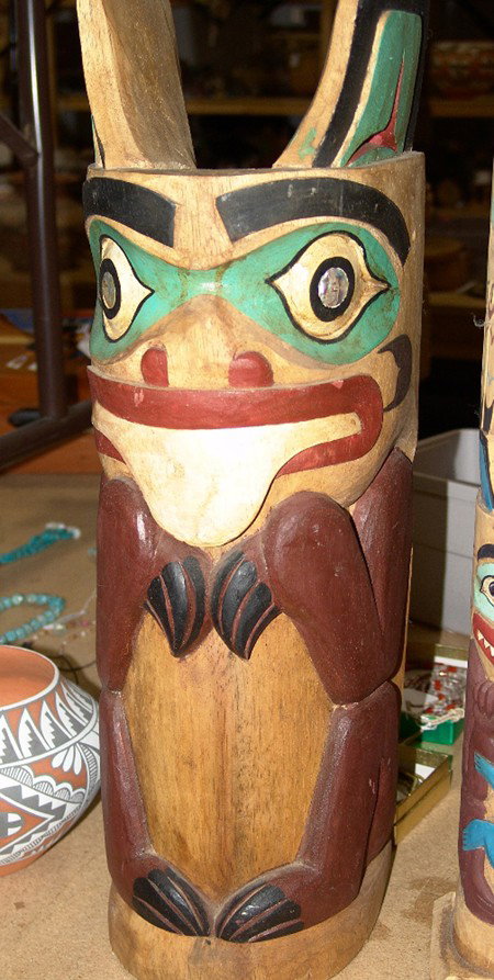 Totem Figure: Hand carved Northwest Coast style bear totem pole with abalone inlaid eyes. Size: 22 x 6-1/2""