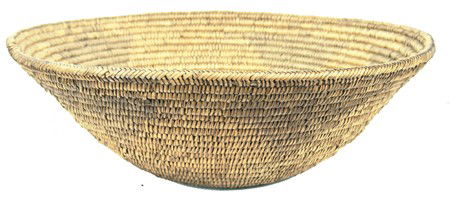 Jicarilla Basket: Early/Mid 1900s, Extra large hard weave basketry tray with traces of its original geometric design. Very good condition but faded with a few missing stitches. 5-1/2" x 18"