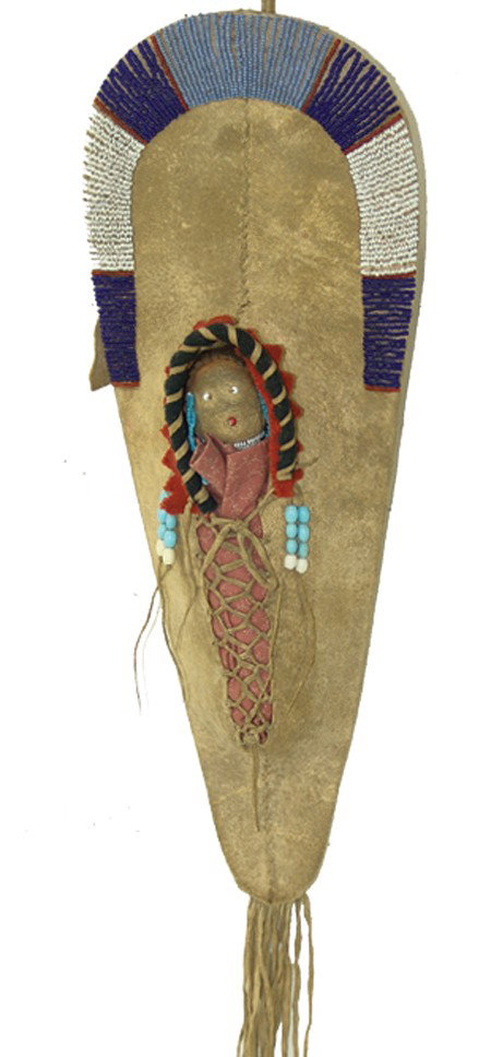 Plateau Toy Cradleboard: Mid 1900s, Outstanding beaded buckskin cradle with doll in very good condition. As illustrated in "Bravehearts and Their Cradles," Janulewicz; page 78. 20" x 6" From the Janulewicz collection.