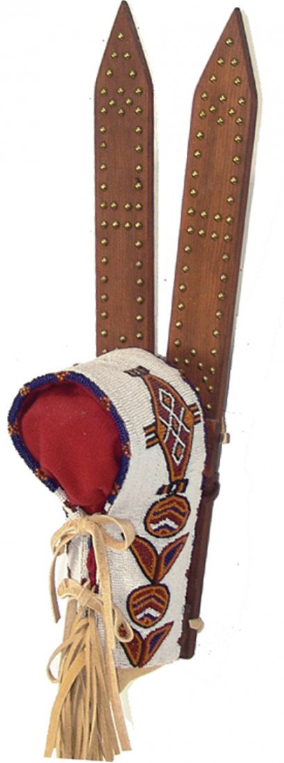 Cheyenne Beaded Cradleboard: Late 1900s, Beautiful fully beaded toy cradleboard with brass tack boards. Excellent condition. Illustrated in "Bravehearts and Their Cradles," page 38. 19" x 5" x 5" From the Janulewicz collection.