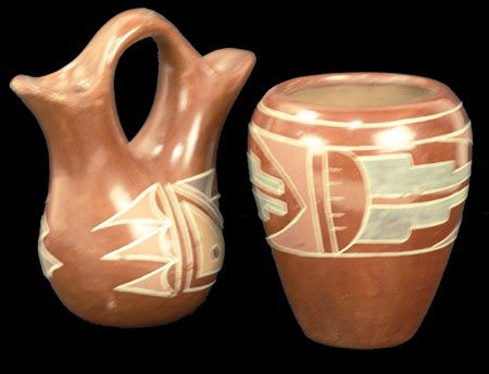 2 San Juan Jars - Dominguita Naranjo: Mid 1900s, Pair of same maker redware polychrome vessels; one a vase, the other a double-necked vase. Both very good used condition, one is signed in pencil. 5-1/2" x 4-1/2" & 6-1/2" x 6" x 4"