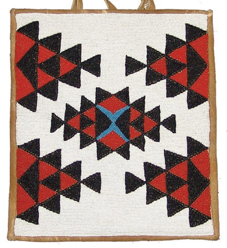 Nez Perce Beaded Bag: Mid 1900s, Large traditional buckskin trimmed ladies bag with striking geometric designs on the fully beaded front. Very good condition. 16" x 14"