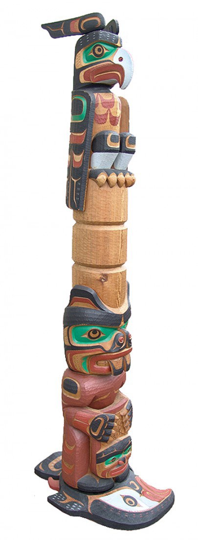 Kwakiutl Totem Pole - Tom Hunt: 1980s, Fantastic hand carved and painted 6-1/2' totem pole with an eagle on top of three Potlach circles, all sitting above a squatting beaver figure. The custom base is made in the form of a salmon a