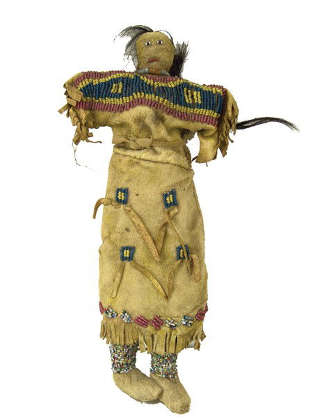 Plains Buckskin Doll: Early 1900s, Beautiful sinew sewn and lazy stitch beaded doll with three-color yoke on the dress, plus moccasins, fringe, and human hair. Very good old condition. 13" long