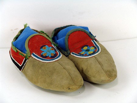 Pucker Toe Moccasins: 1940s, Pair of pucker toed Cree moccasins with velvet background. Good condition with some repairs. 11" long
