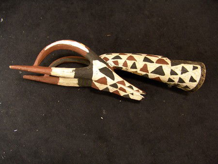 African Headdress: 1960s, Hand carved and painted animal headdress with large horns. Condition: Fragile, has split and been repaired more than once. 46" x 9" x 10"