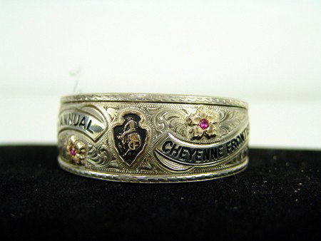 Cheyenne Rodeo Bracelet: 1996, Very fine sterling and gold overlay bracelet with ruby accents. Princesses Award Bracelet from the 1996 Cheyenne Frontier Days 5-1/2"